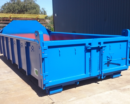 Blauer Bauschuttmulden-Container in für die umweltgerechte Entsorgung von Baumaterialien